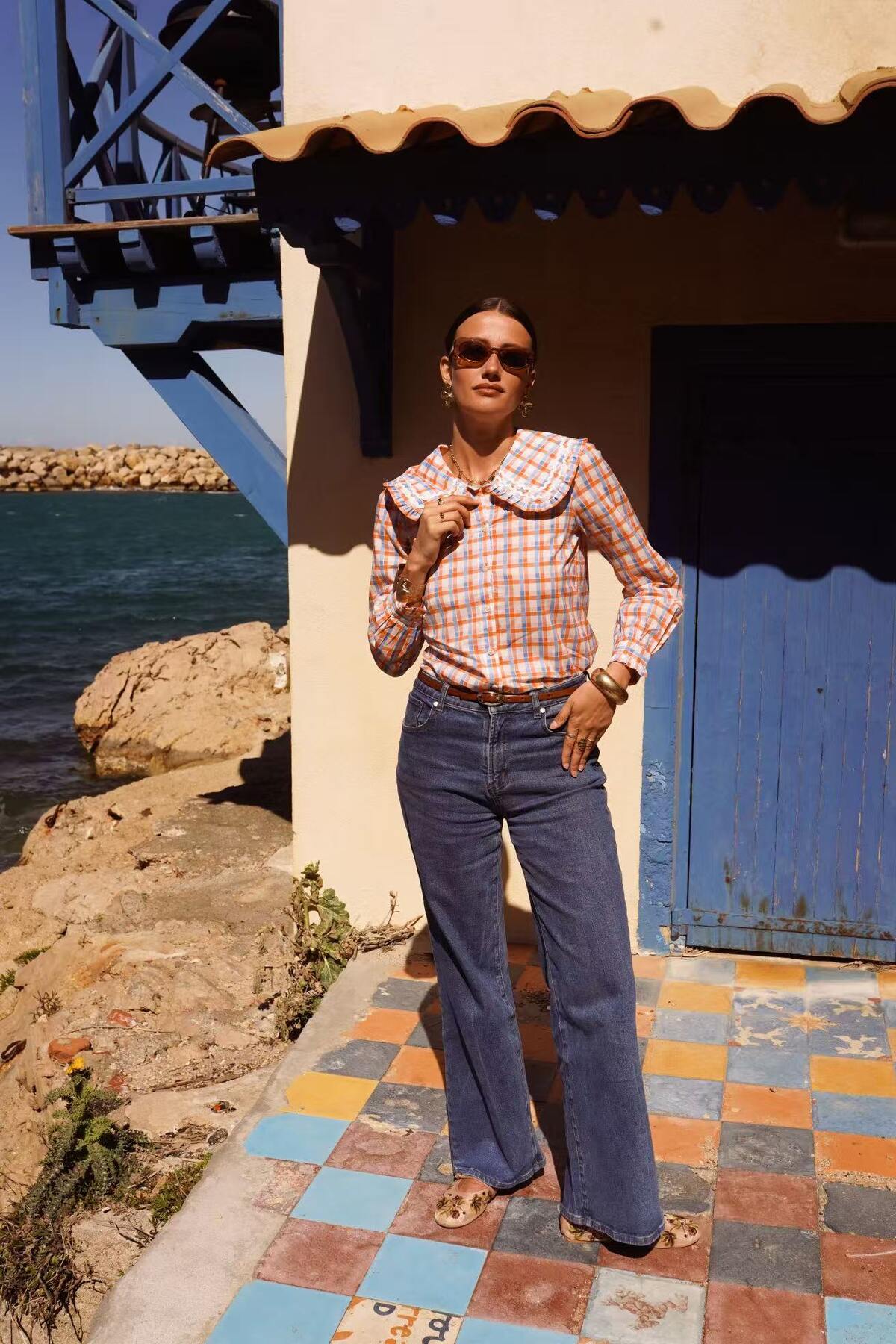 Orange and blue checkered blouse