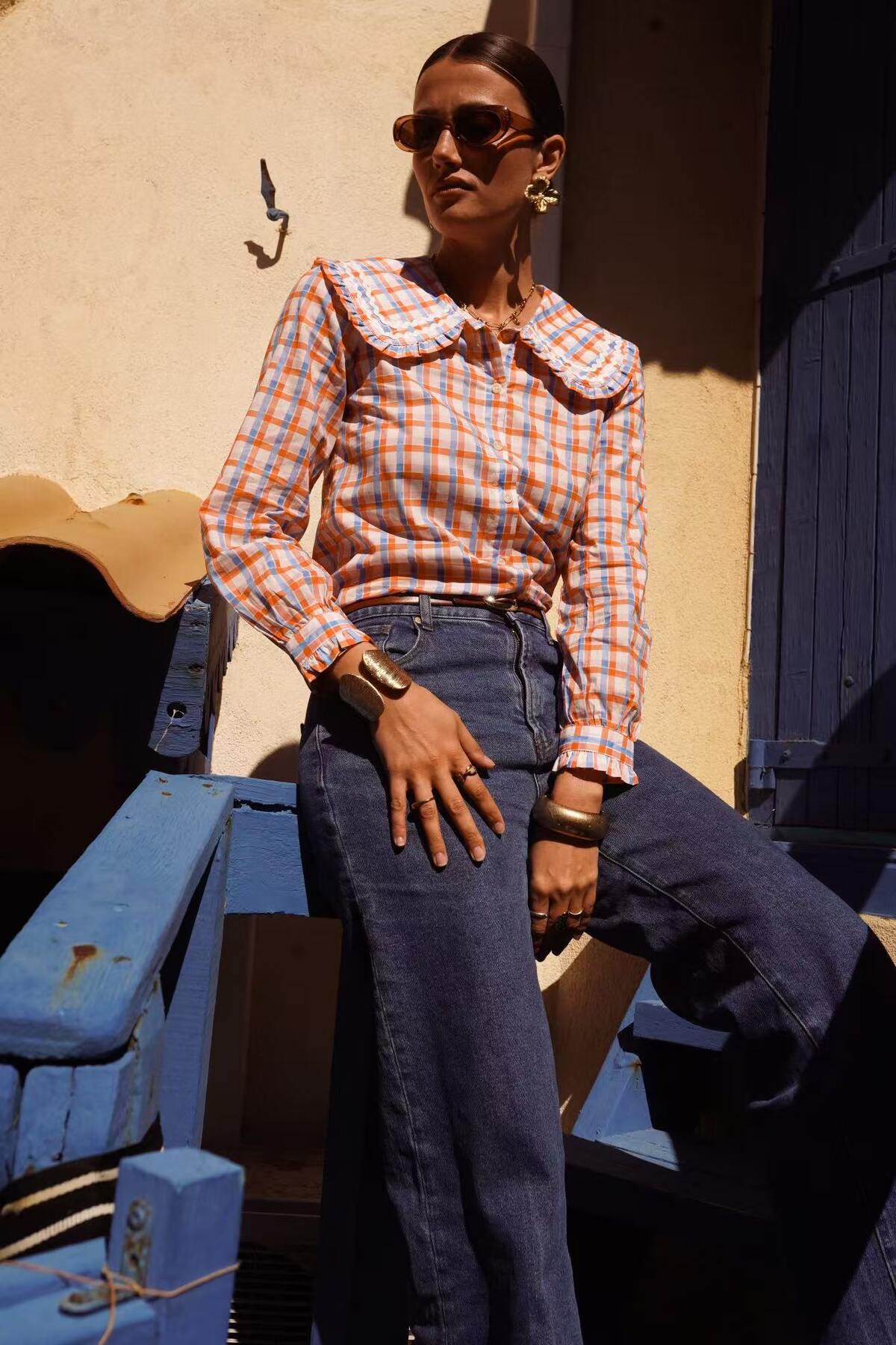Orange and blue checkered blouse