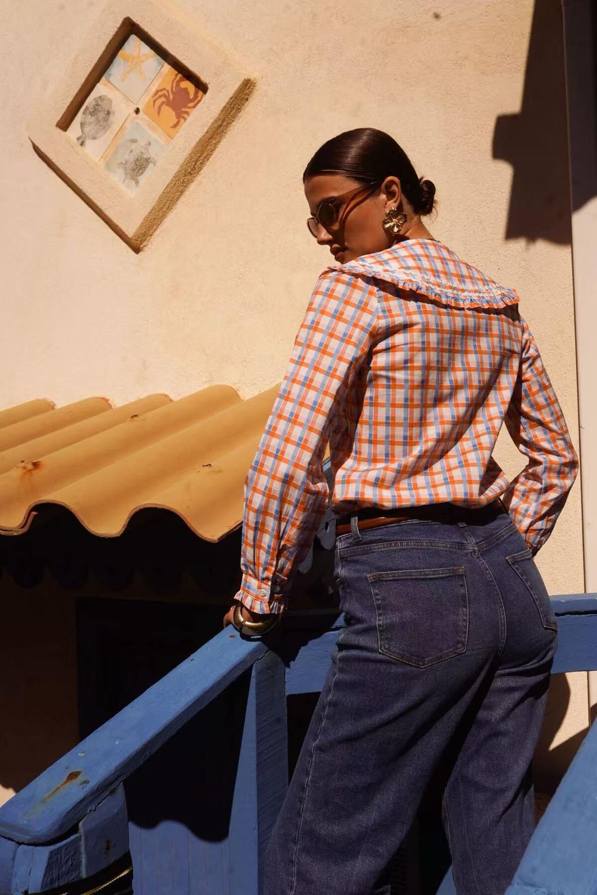 Orange and blue checkered blouse