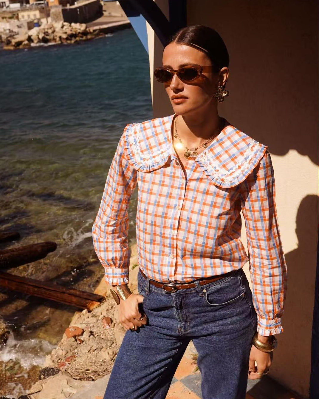 Orange and blue checkered blouse