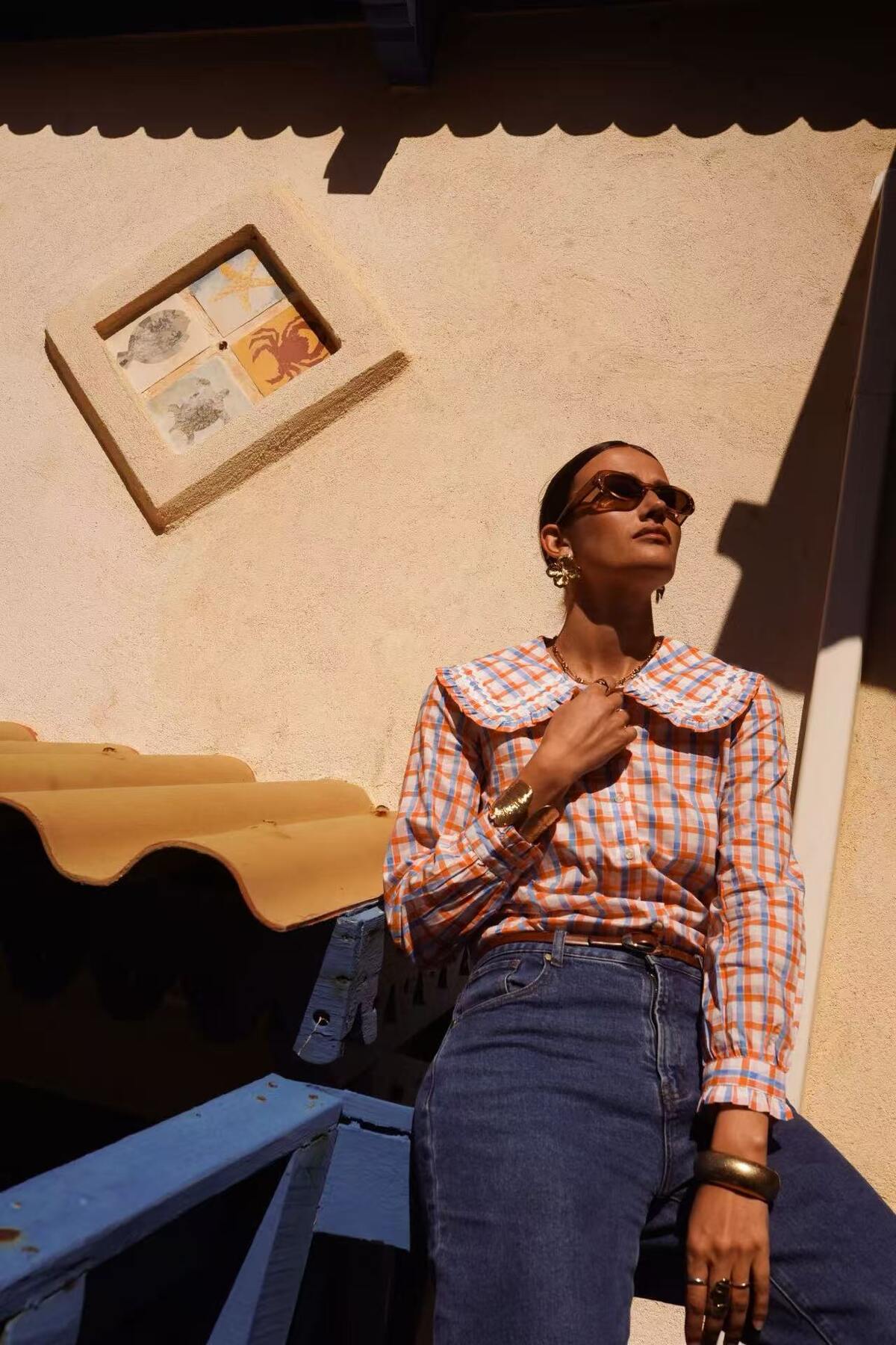Orange and blue checkered blouse